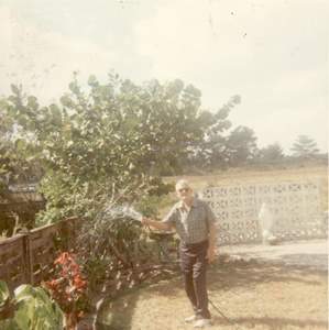labeled Pap Sprinkling BackYard 1970 Husman Picture 98