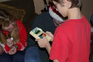 17 Mary and Zack play vintage electronic game Picture 17