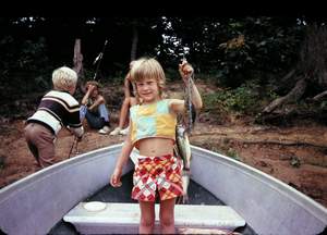 Kathy with fish in boat Picture 371