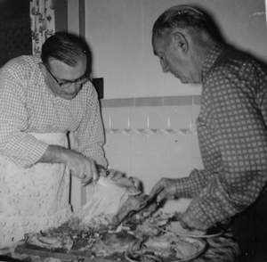 165 Henry and Grandpa Witter Carving Turkey Picture 165