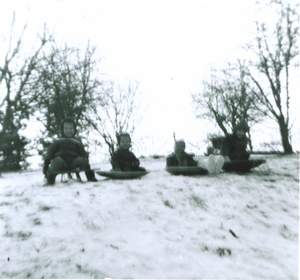 242 Rick Ron Ann Bill sledding Picture 242